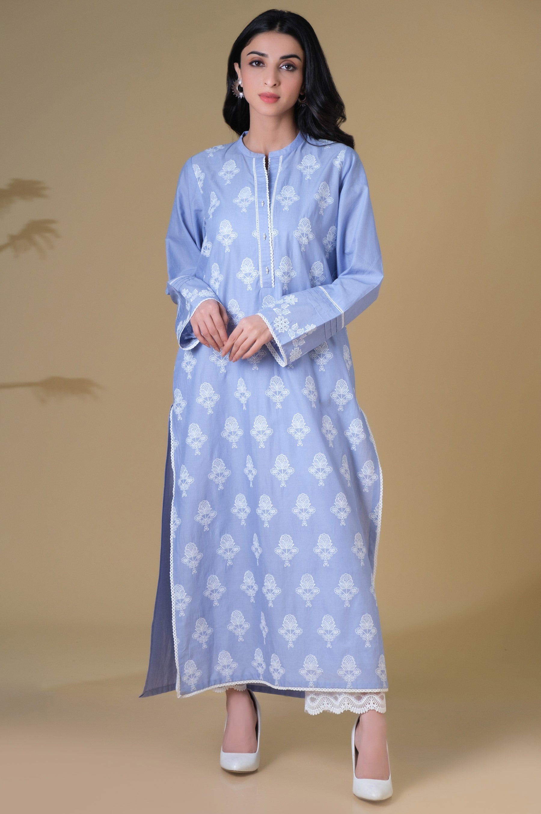 Striking black chikankari angrakha-style shirt with timeless white embroidery. main image 0