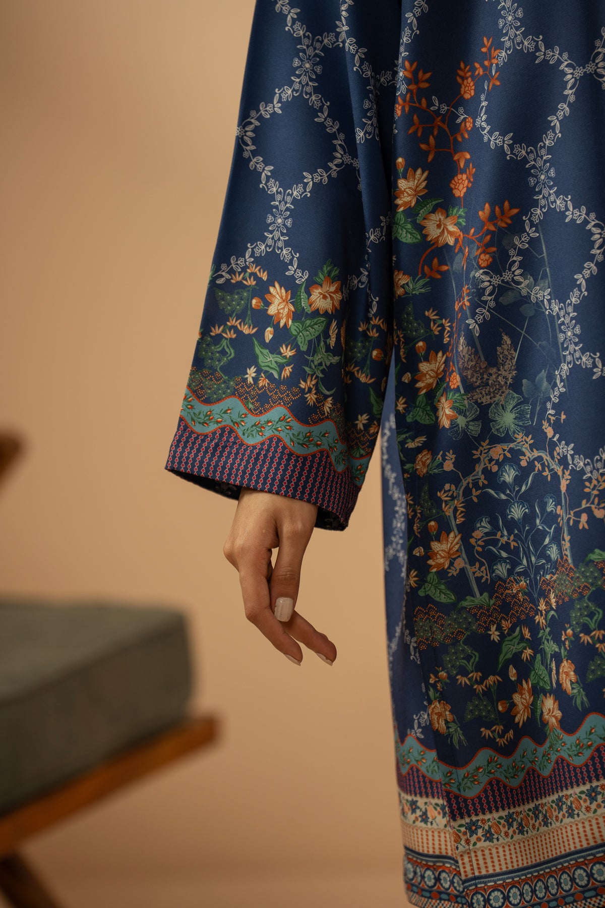 Casual stitched 2-piece blue poly cambric suit highlighted by sharp contemporary patterns