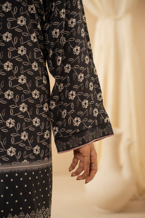 Casual stitched black linen top with modern abstract print patterns and a comfortable fit