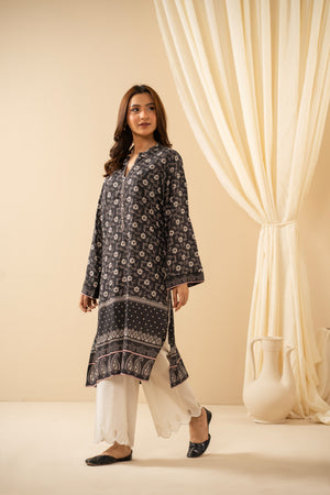 Casual stitched black linen top with modern abstract print patterns and a comfortable fit