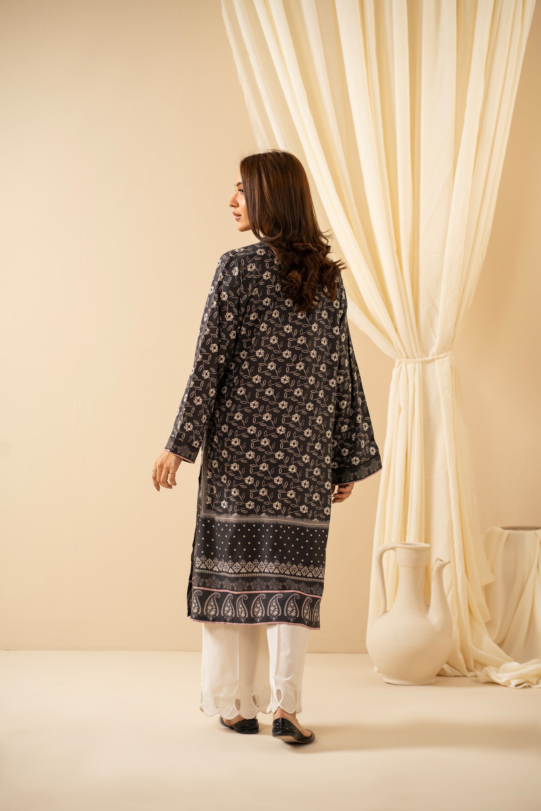 Casual stitched black linen top with modern abstract print patterns and a comfortable fit