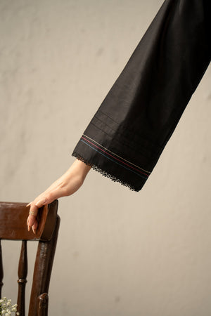 High-fashion stitched 3-piece black cambric suit with unique stylized cuts, matching dupatta, and trousers