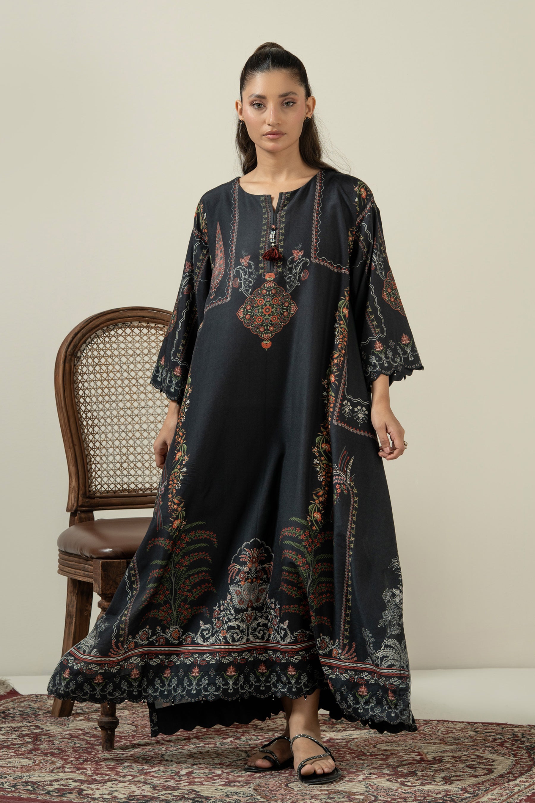 Sleek black stitched 1-piece poly cambric top decorated with contrasting minimalist graphic prints