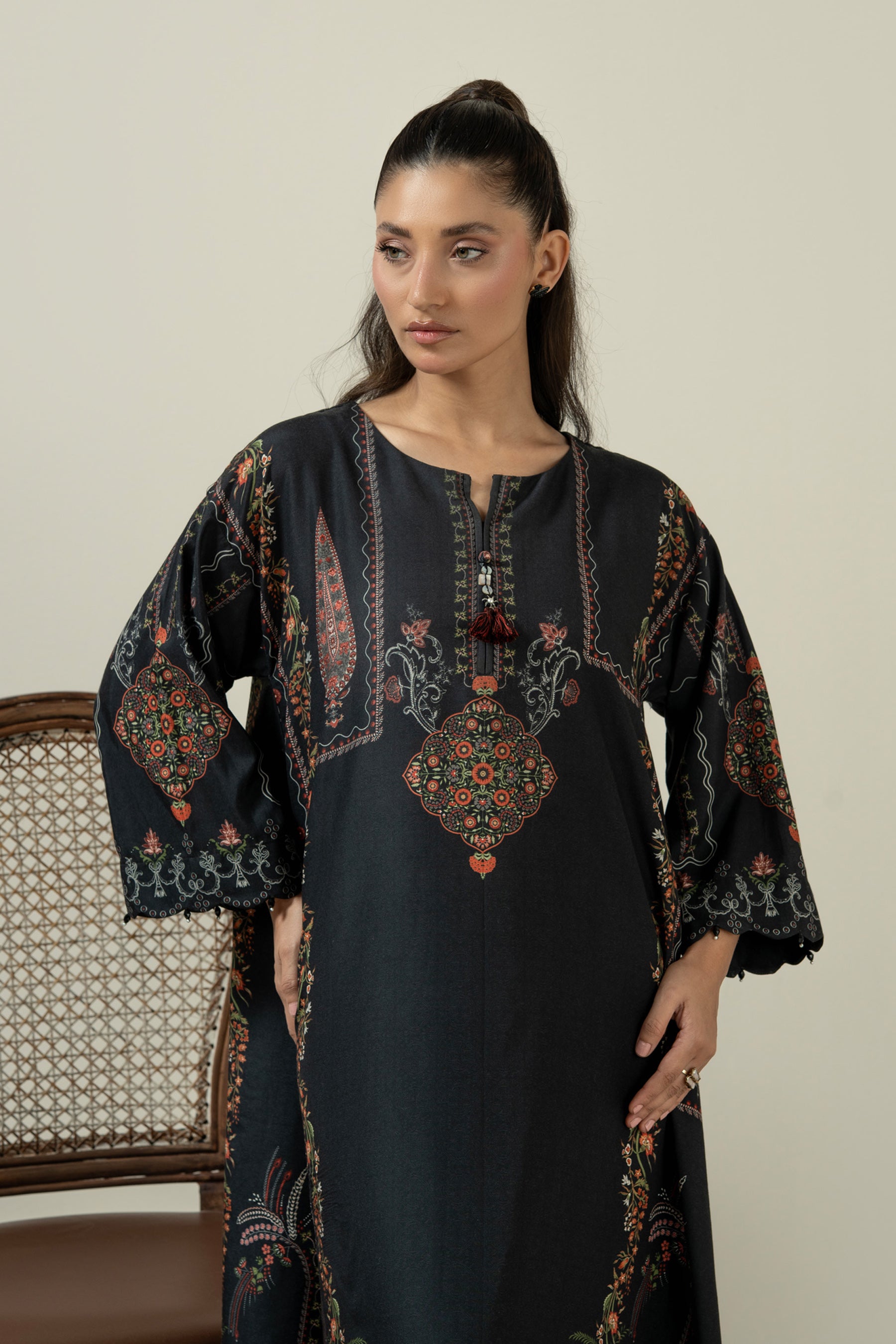 Sleek black stitched 1-piece poly cambric top decorated with contrasting minimalist graphic prints