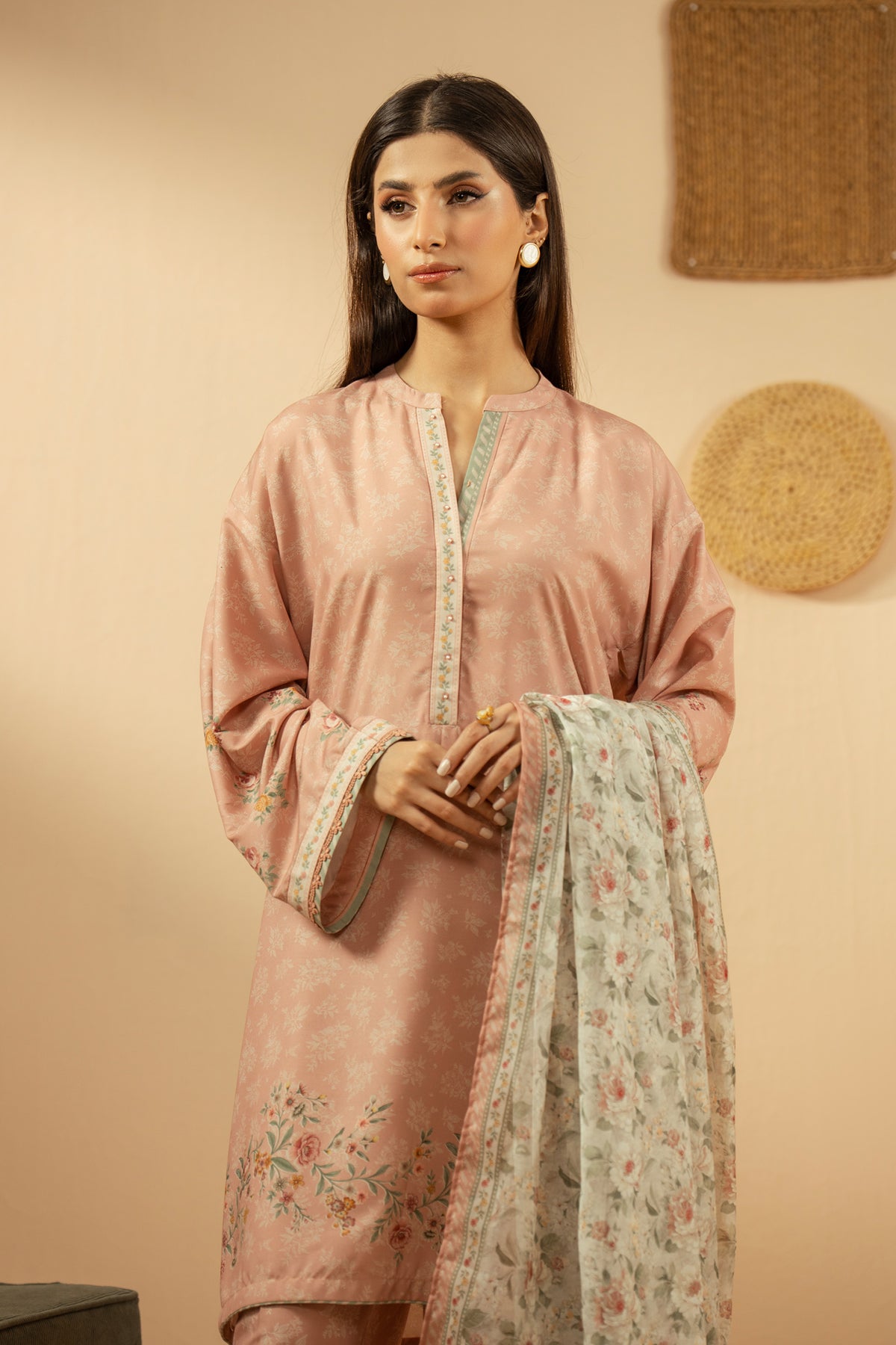 Soft peach stitched 3-piece poly cambric suit featuring intricate floral print layouts, matching dupatta, and trousers