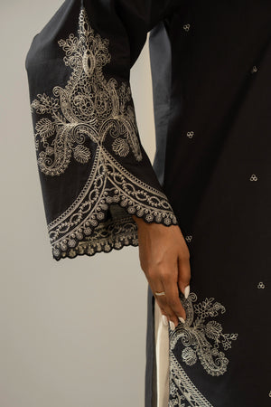 Sophisticated black embroidered cambric 2-piece stitched suit showcasing elegant neckline detailing and matching trousers