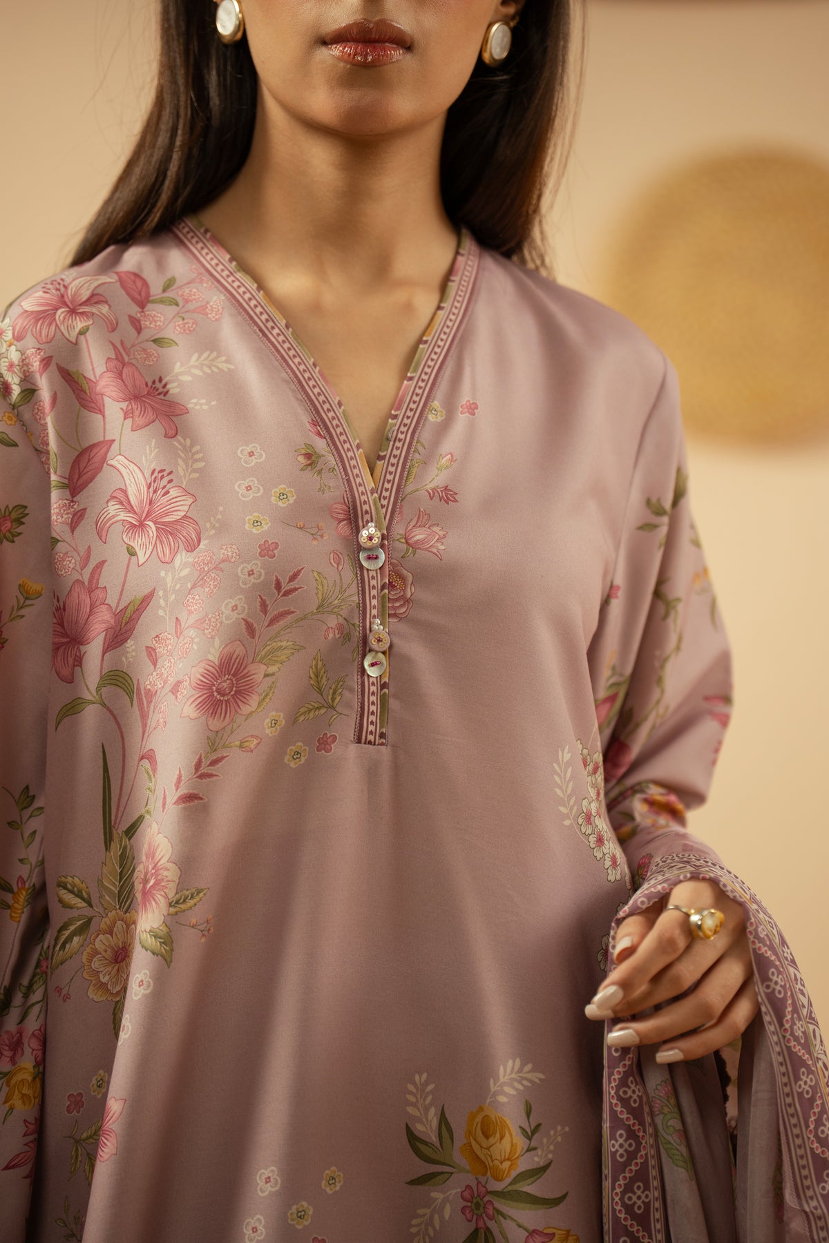 Stitched 3-piece mauve poly cambric suit with delicate geometric patterns, matching dupatta, and trousers from the Performance Edit