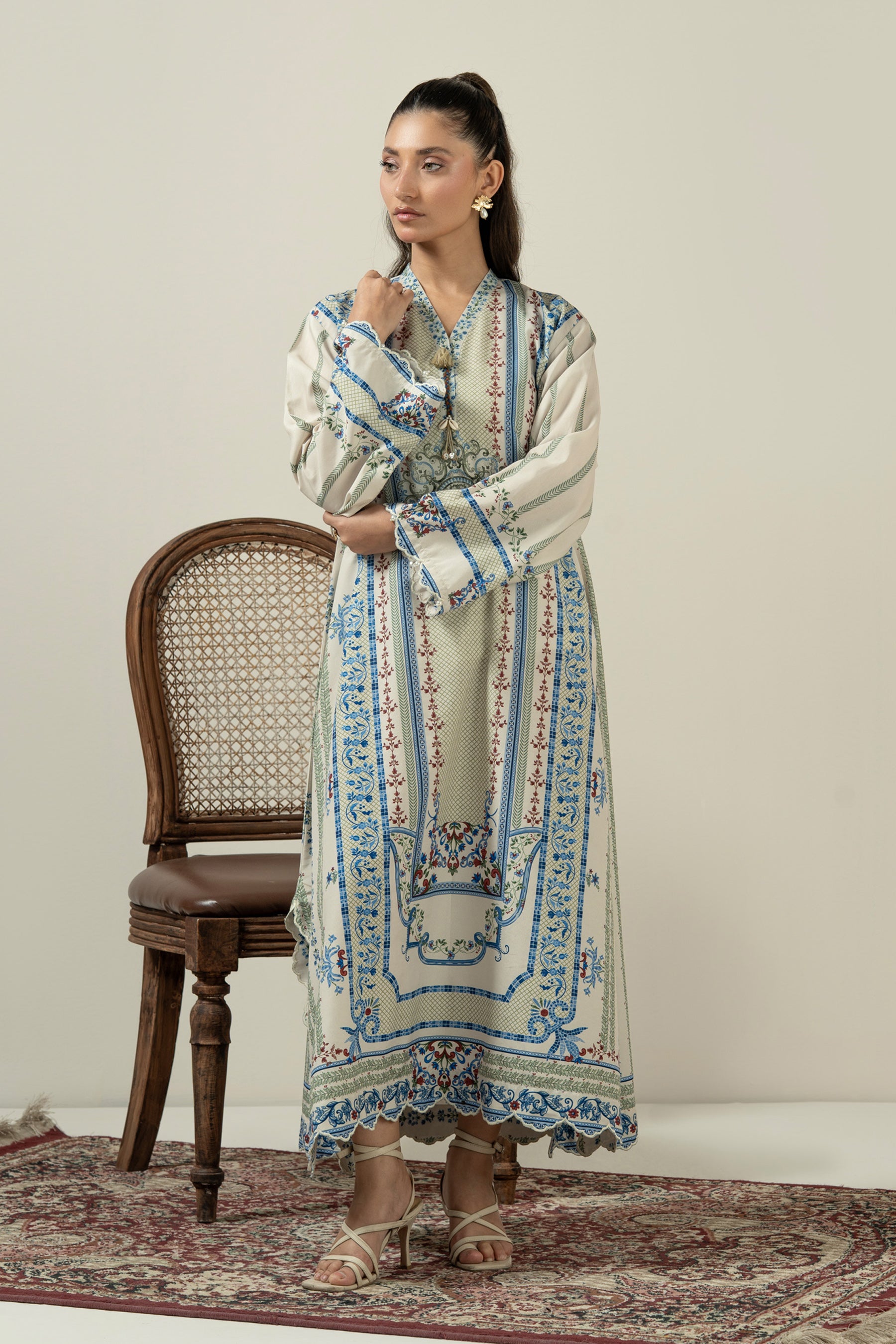 Vibrant multi-colored printed poly cambric 1-piece stitched top showcasing a bold and artistic color palette