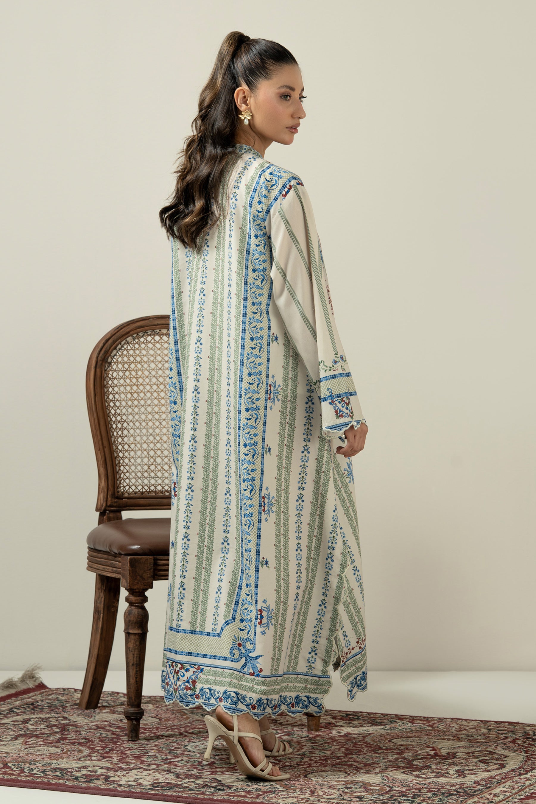 Vibrant multi-colored printed poly cambric 1-piece stitched top showcasing a bold and artistic color palette