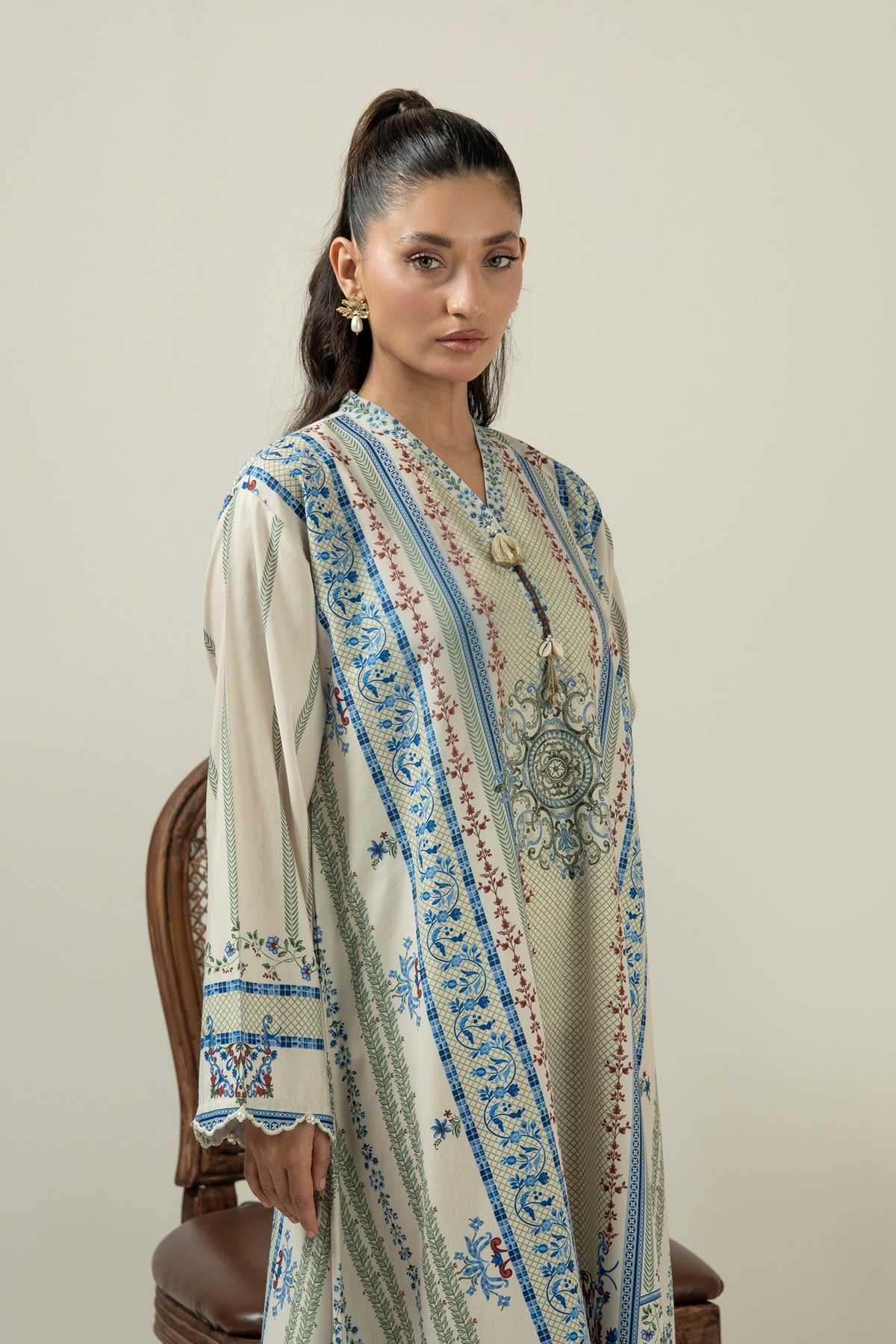Vibrant multi-colored printed poly cambric 1-piece stitched top showcasing a bold and artistic color palette