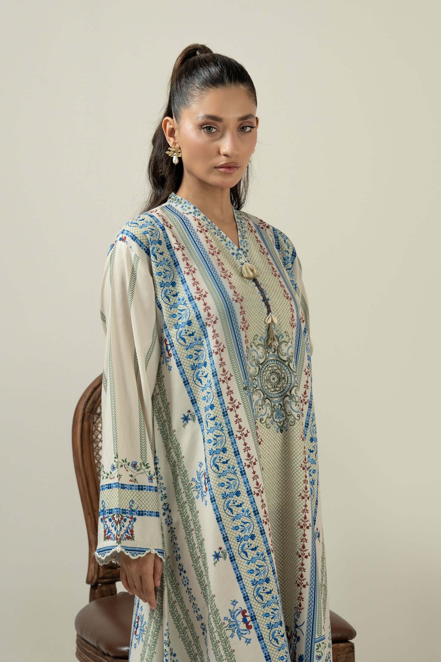 Vibrant multi-colored printed poly cambric 1-piece stitched top showcasing a bold and artistic color palette