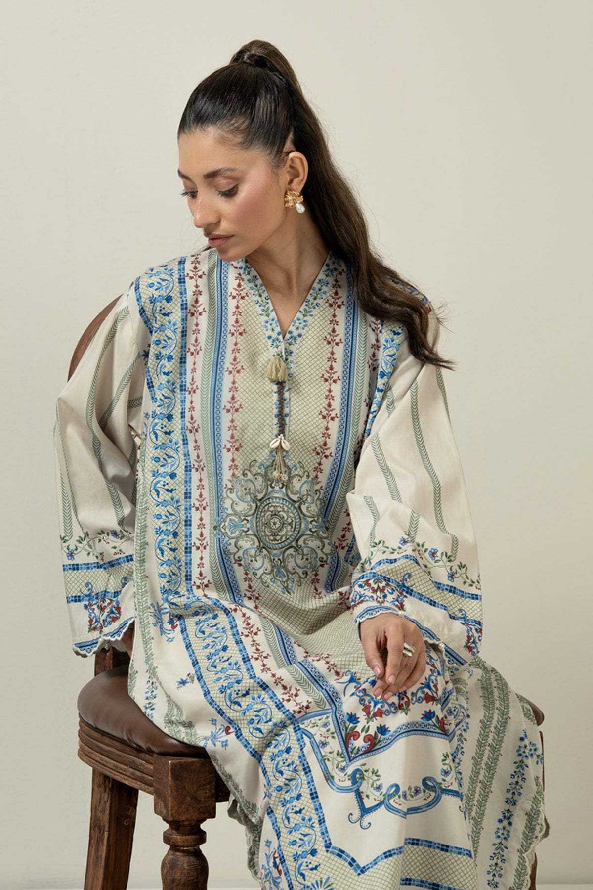 Vibrant multi-colored printed poly cambric 1-piece stitched top showcasing a bold and artistic color palette