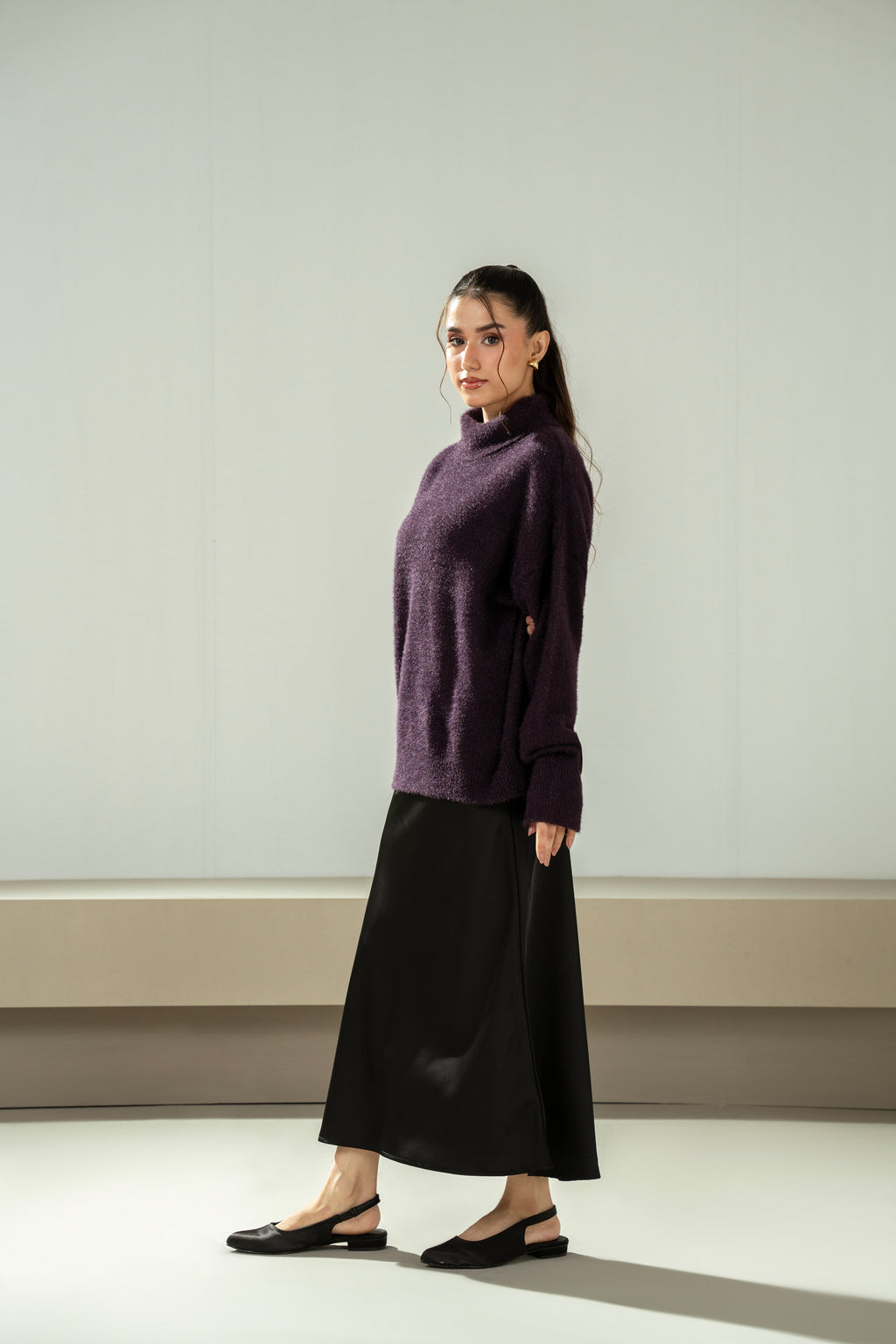 STYLIZED HIGH NECK