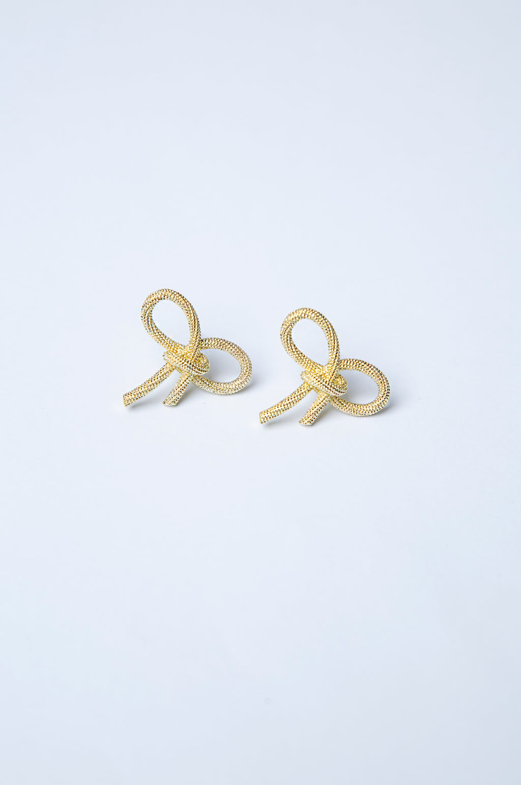 Bow Rhodium Plated Earrings