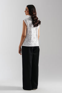 SLEEVELESS PRINTED POLO