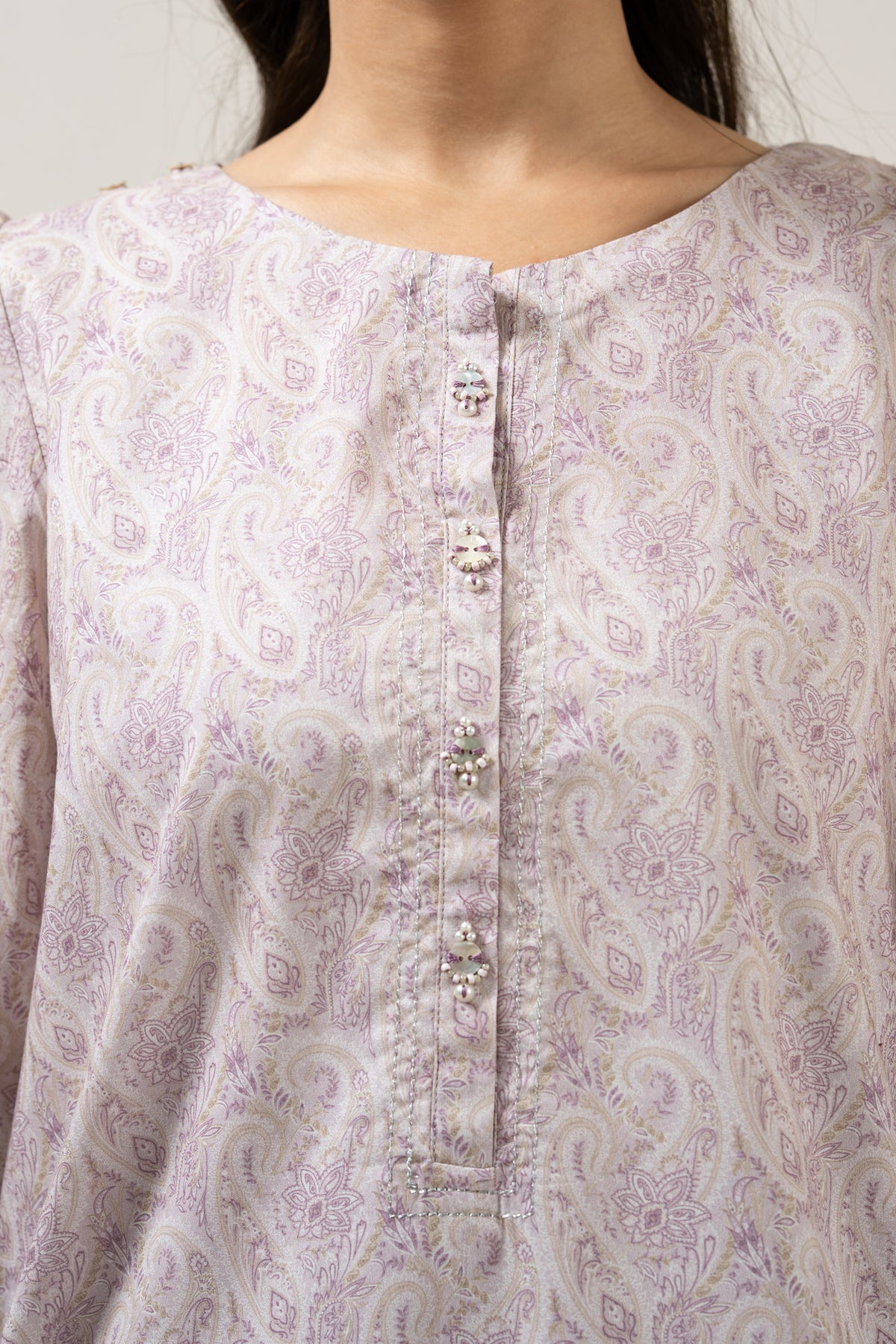 Delicate lilac unstitched 3-piece printed lawn suit highlighted by charming pastel aesthetic patterns