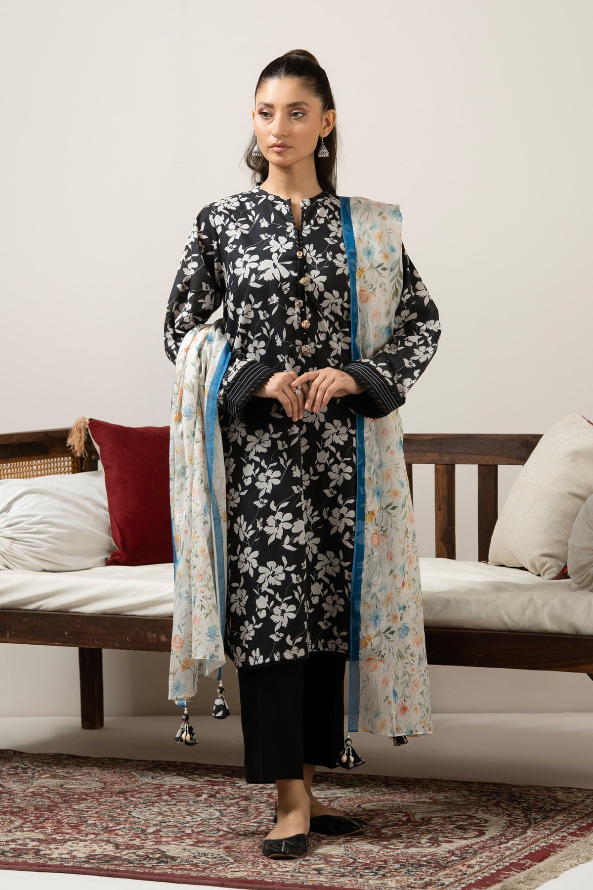 Luxury black unstitched 3-piece printed lawn dress material featuring detailed ethnic print layout lines