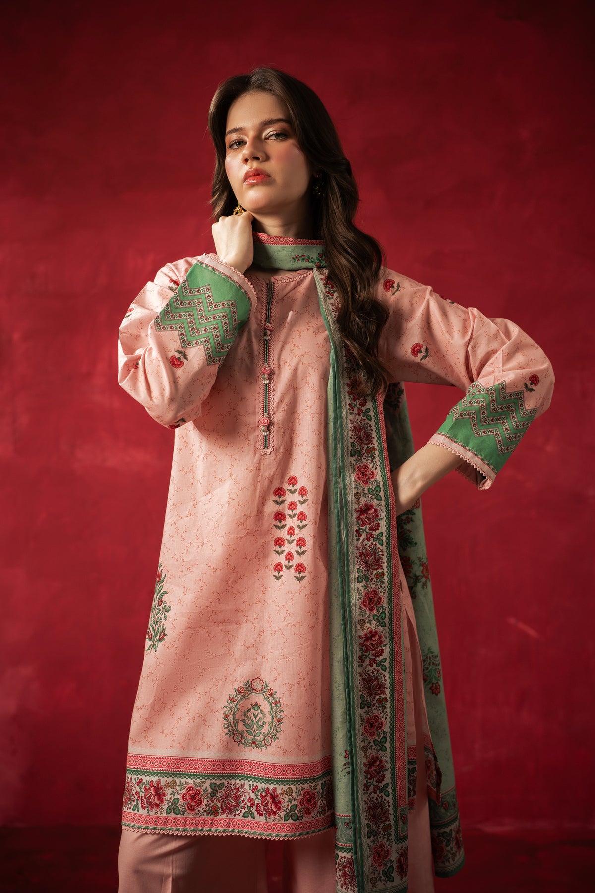 Premium peach printed lawn unstitched 3-piece suit with a coordinating dupatta and trousers from Zeen Zoe Collection