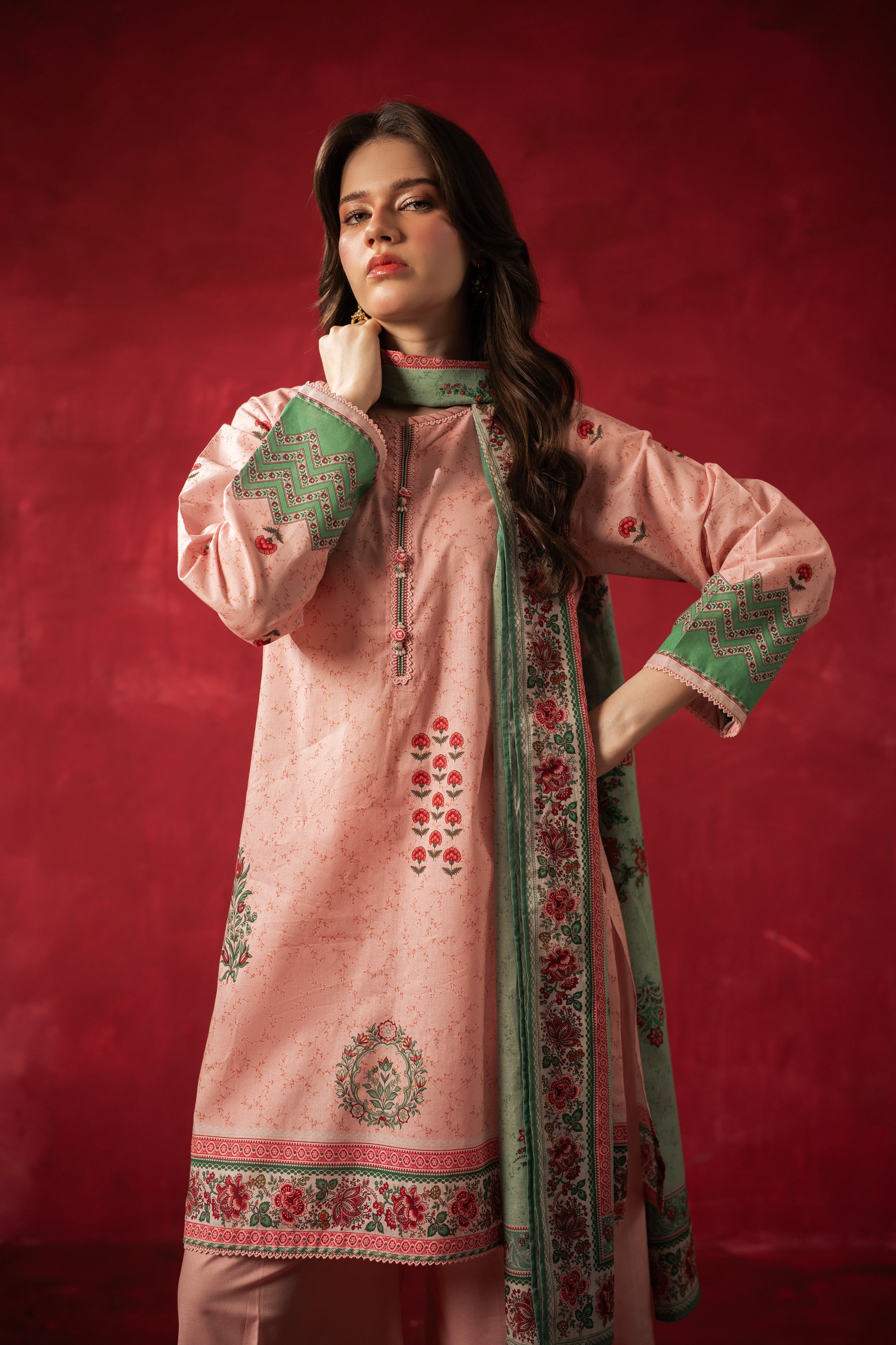 Premium peach printed lawn unstitched 3-piece suit with a coordinating dupatta and trousers from Zeen Zoe Collection
