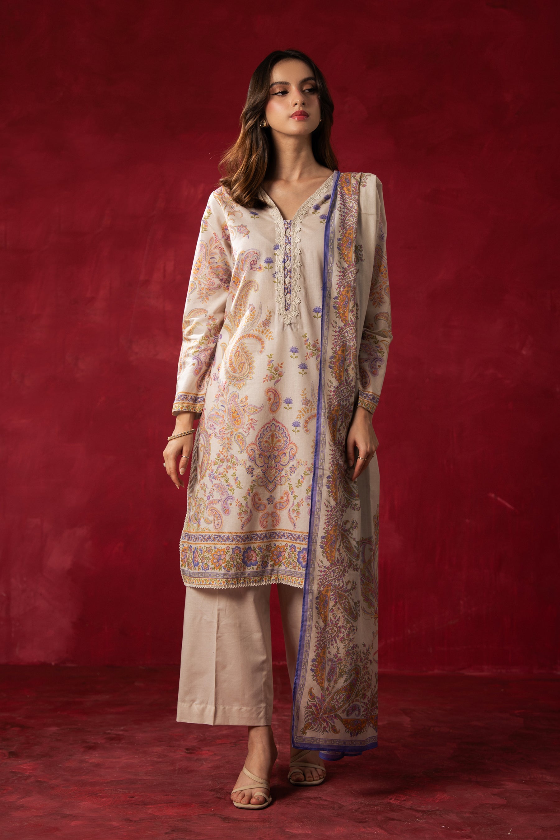 Pristine off-white printed lawn unstitched 3-piece suit with elegant panel patterns and soft dupatta drape