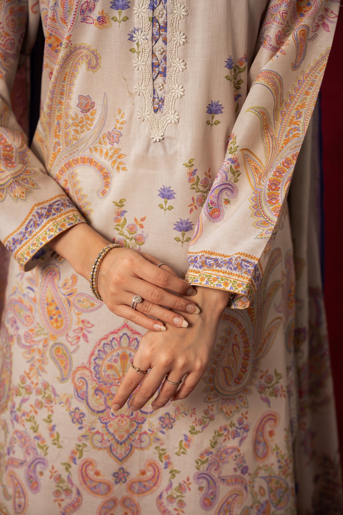 Pristine off-white printed lawn unstitched 3-piece suit with elegant panel patterns and soft dupatta drape