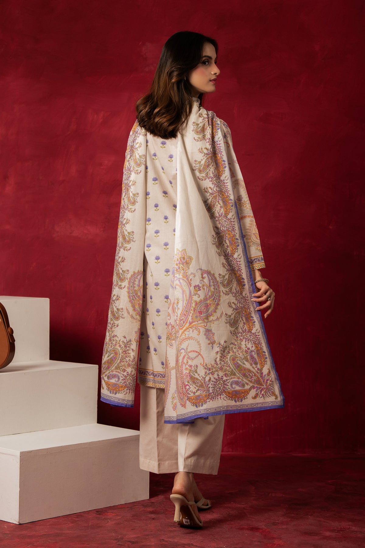 Pristine off-white printed lawn unstitched 3-piece suit with elegant panel patterns and soft dupatta drape