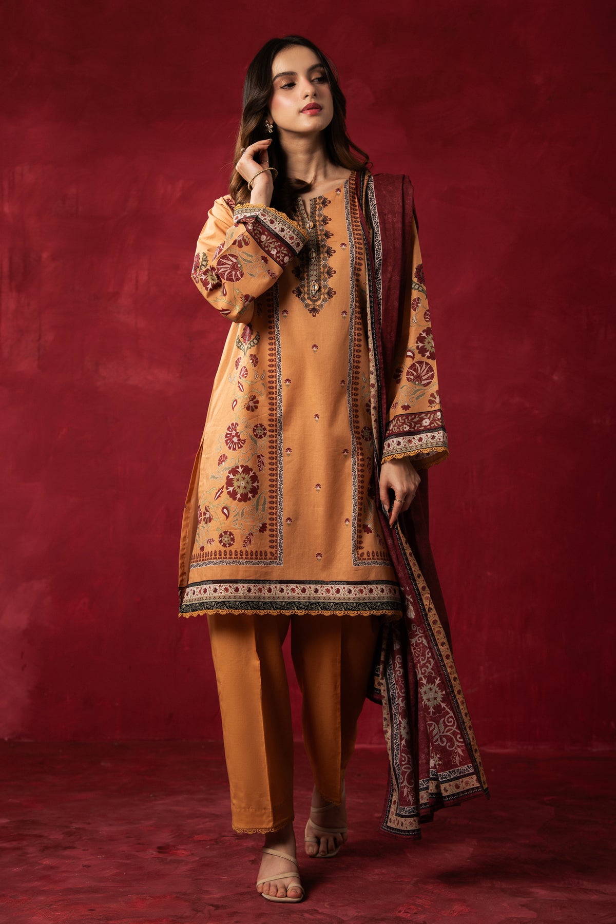 Sophisticated chrome yellow printed lawn unstitched 3-piece suit with an intricately designed seasonal dupatta