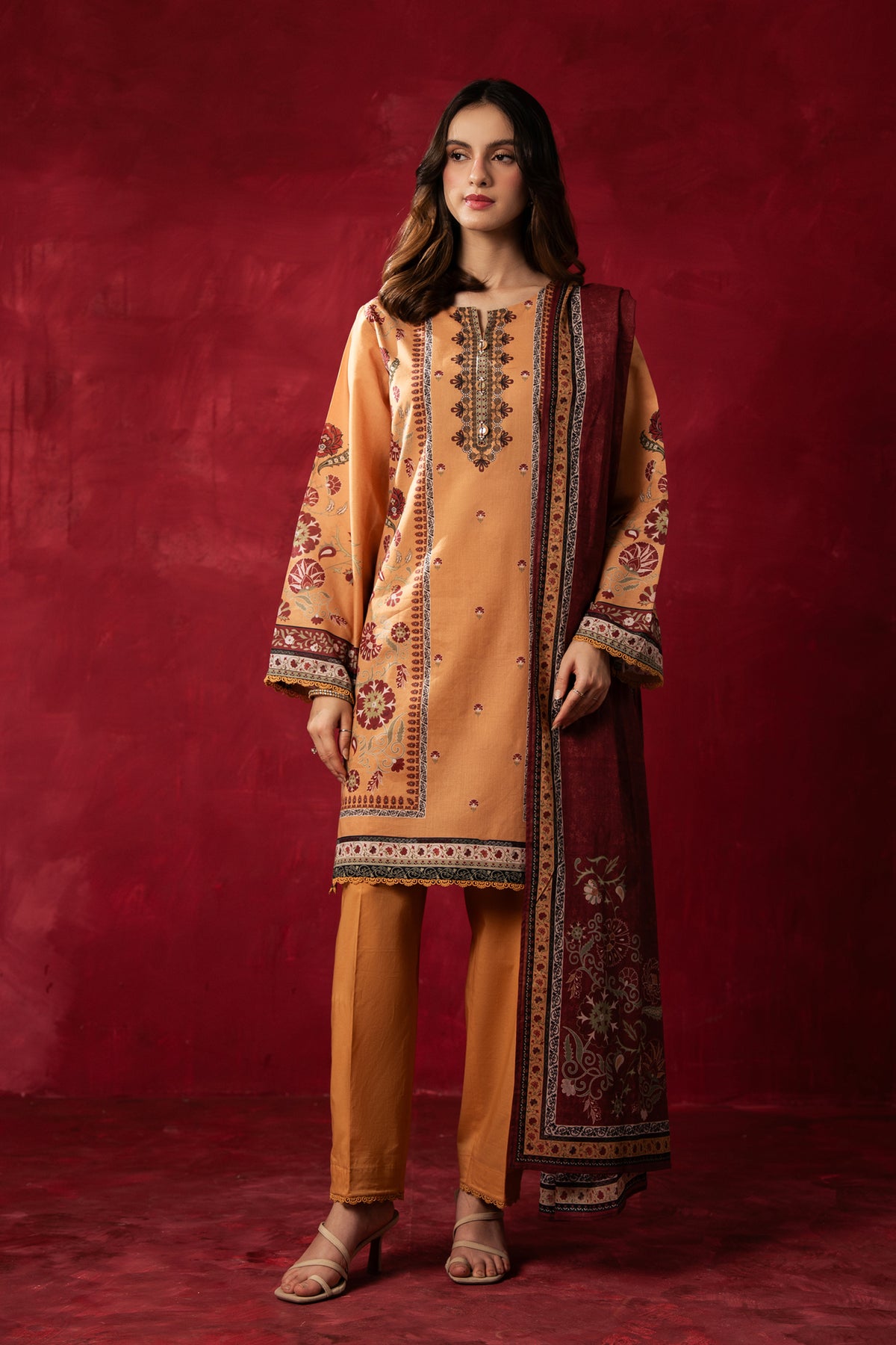 Sophisticated chrome yellow printed lawn unstitched 3-piece suit with an intricately designed seasonal dupatta