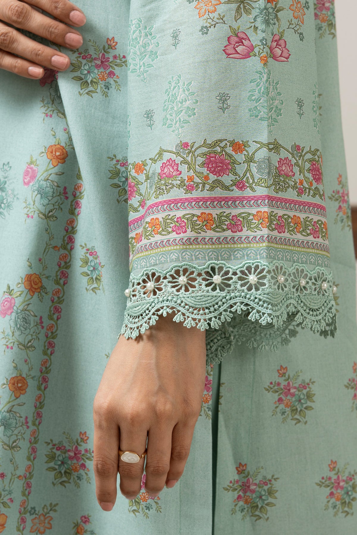 Vibrant aqua blue printed lawn unstitched 3-piece suit curated for a cool and stylish seasonal look